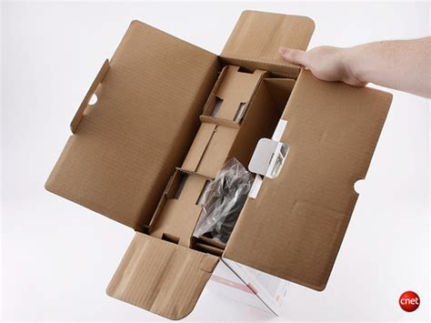 playstation  slim unboxing  cnet