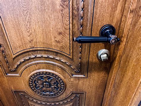 Elegantly Crafted Wooden Door Featuring Stunning Vintage Hardware