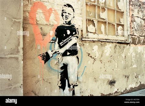 stenciled street art  graffiti artist banksy  islington london
