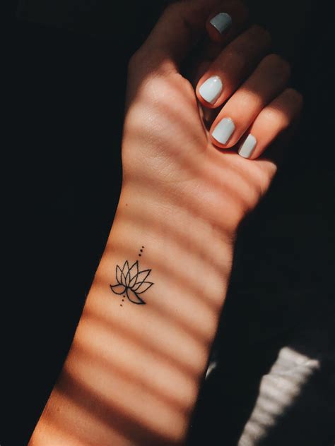 delicate flower tattoos 9