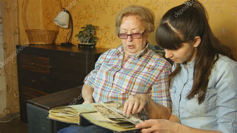young woman   family photo album stock photo oleg