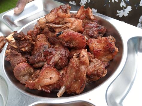 Delicious Pork Delicacies at Pork Hub Kisaasi, Uganda: A Culinary