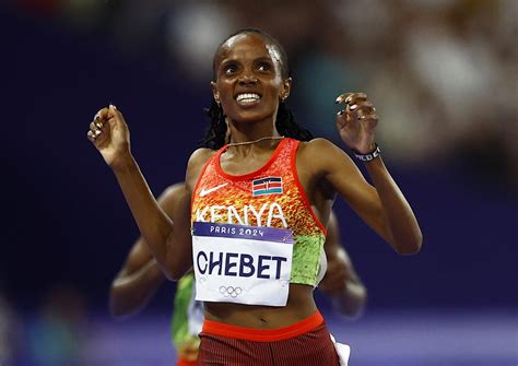 Athletics-Kenya's Chebet charges to 5,000m gold, Kipyegon's silver