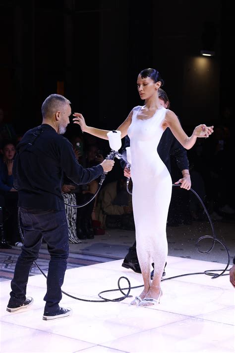 Bella Hadid went viral for this spray-painted slip dress on the Coperni
