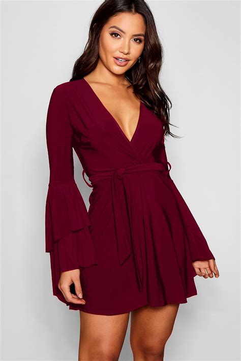 Plunge Neck Flared Sleeve Skater Dress | boohoo | Low cut dresses