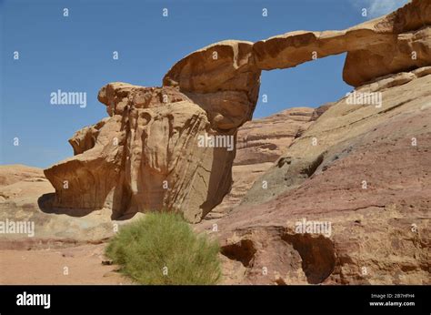Natural rock bridge in Wadi Rum Stock Photo - Alamy
