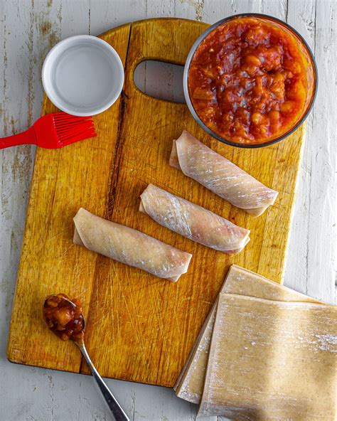 Peach Cobbler Egg Rolls - CheekyKitchen