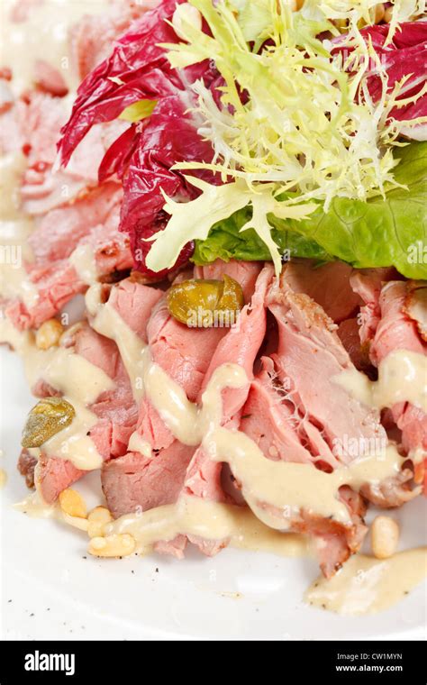 Roast beef with sauce Stock Photo - Alamy