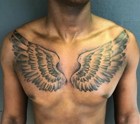 Wing Tattoo Designs On Chest