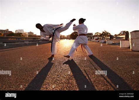 People, karate and fitness with personal trainer in city street for