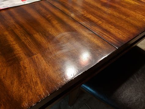 How to remove light scratches from table finish : howto