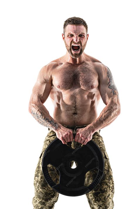 Premium Photo | Muscular athlete bodybuilder man in camouflage pants