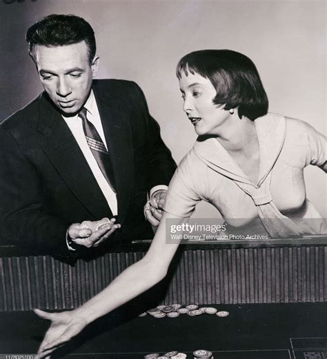 Carolyn Jones and Dane Clark