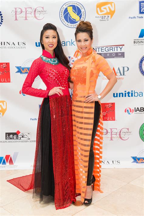 Red Christy Pham Ao Dai on Sophie Bao Tran and Orange Christine Nguyen
