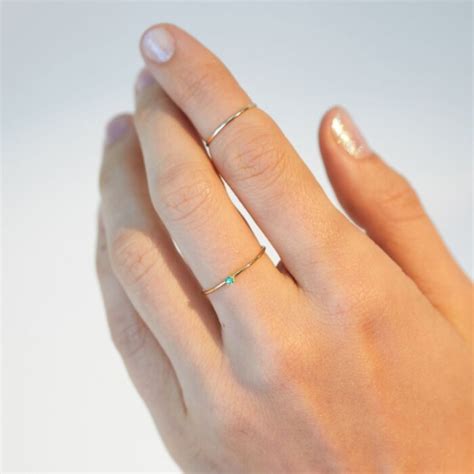 tiniest ring emerald tiny rings flower engagement ring