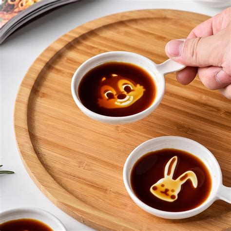 sauce dishes    fun designs including winnie  pooh