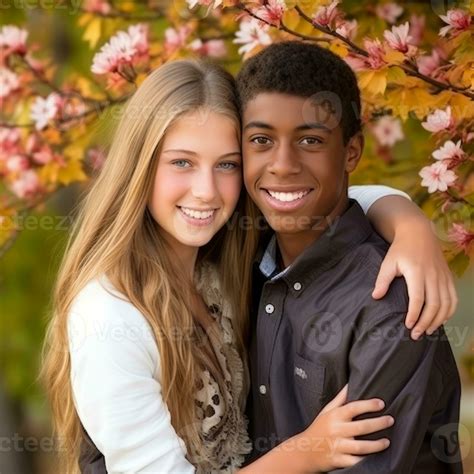 Loving teenage interracial couple is enjoying a romantic autumn day AI