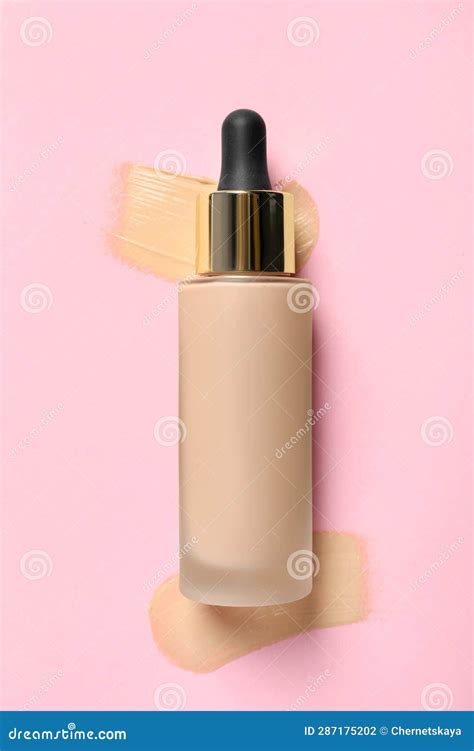 Liquid Foundation and Swatches on Pink Background, Top View Stock Photo ...