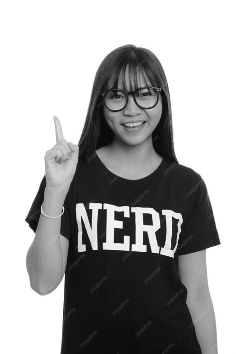 Premium Photo | Young nerdy asian teenage girl with eyeglasses isolated