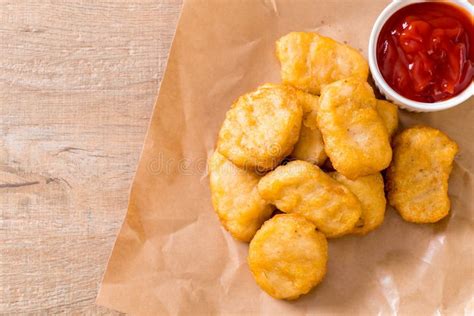 Chicken nuggets with sauce stock image. Image of dinner - 133434079