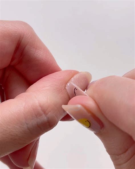 how to put on fake nails without nail glue