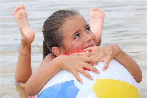 little girl swimming | Stock image | Colourbox