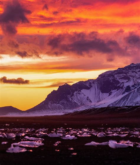 An epic sunset over Diamond Beach, Iceland [1820x2150] [OC] : r/EarthPorn
