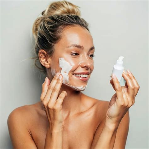 Premium Photo | Studio shot of young woman using anticellulite cream