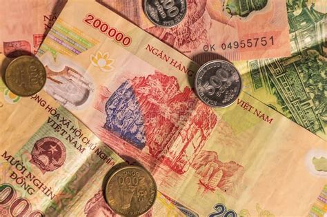 Vietnamese dong VND banknotes and coins. A composition of Vietnamese ...