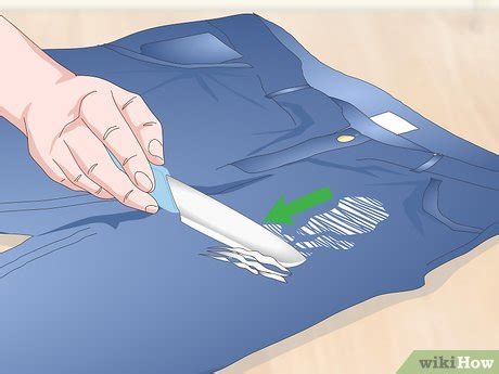 how to get dry paint out of clothes