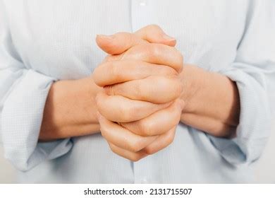 fingers intertwined stock   images shutterstock