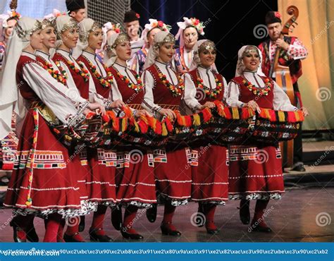 People in Traditional Folklore Costumes Perform Folk Dance Bulgarian