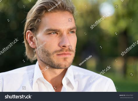 blonde hair green eyes man images stock  vectors