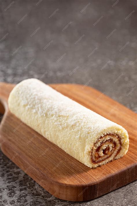 Premium Photo | Swiss roll cake filled with guava paste