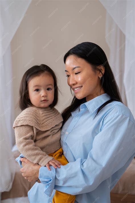 Free Photo | Asian mother and daughter spending time together at home