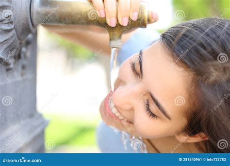 Happy Woman Drinking Water from Public Fountain Stock Image - Image of ...