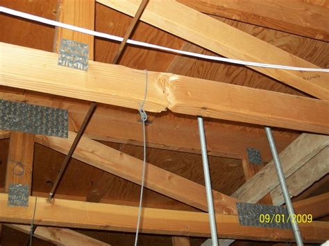 broken roof truss repair restoring structural integrity