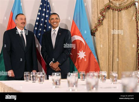 United States President Barack Obama (R) poses with President Ilham ...