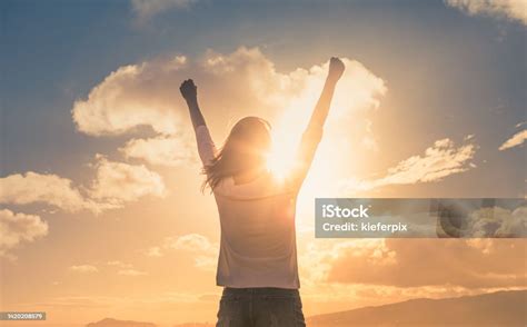 strong woman overcoming adversity stock photo  image