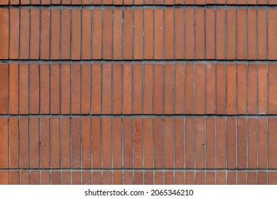 orange tiles vertical brick wall paris stock photo