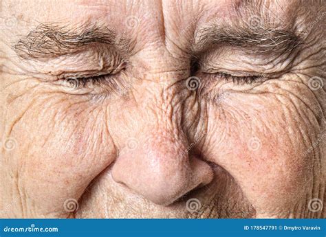 wrinkled  face close  portrait    woman  closed eyes