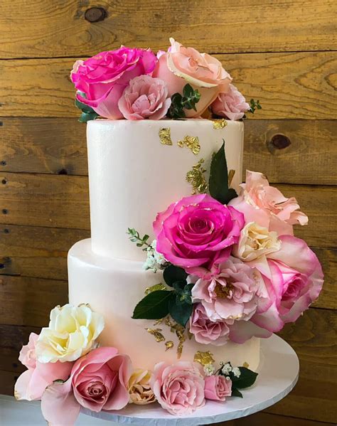 pink floral wedding cake  wedding trends   reinventing classic