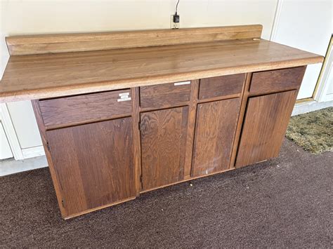 Solid wood entertainment center/storage cabinet for Free in Austin, TX