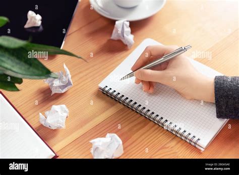 workplace  writer rewriter female hand holding   writing