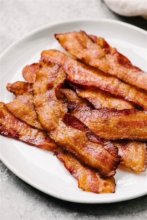 Bacon Revival: 5 Ways To Reheat Cooked Bacon To Its Former Glory