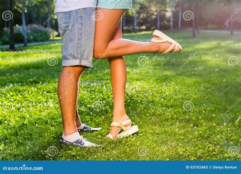 lovers kissing   park stock image image  outdoor grass