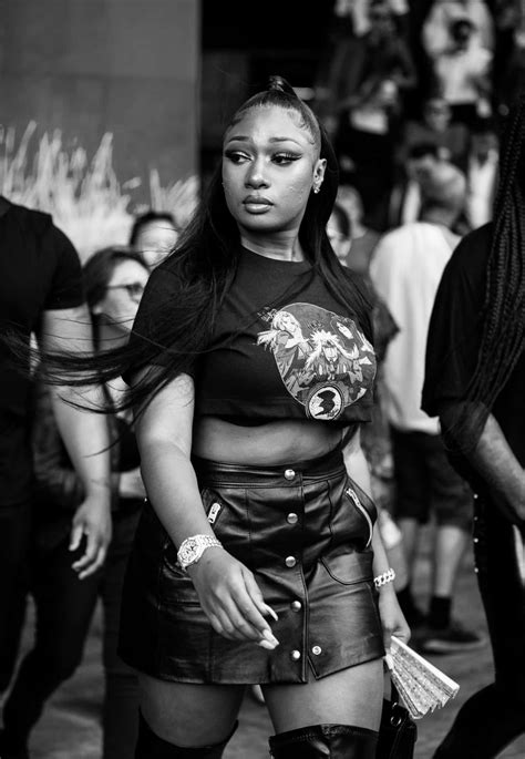 Download Megan Thee Stallion striking a pose in a stylish outfit