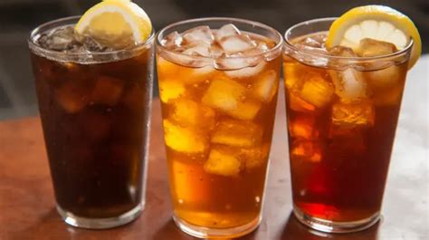 iced tea   ice cubes  straw iced tea iced drink beverage