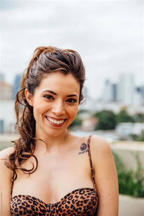 "Portrait Of A Young Pretty Latina Woman" by Stocksy Contributor "Jayme