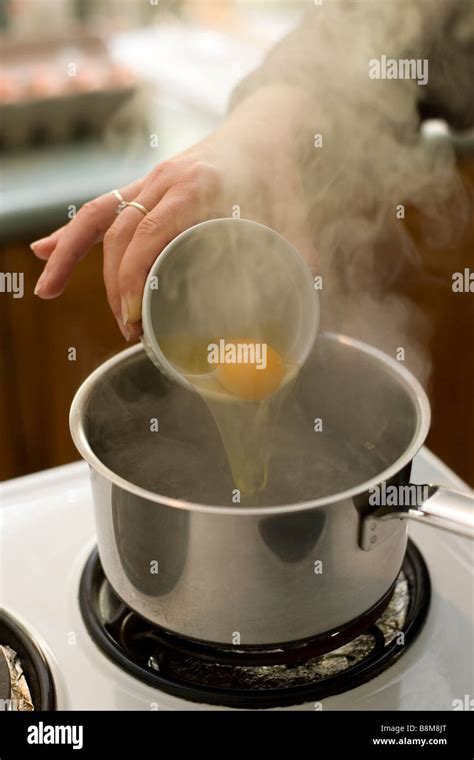 boiling an egg Stock Photo - Alamy